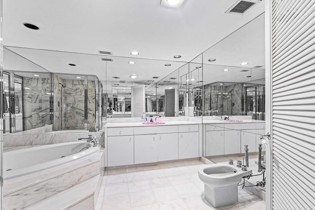 bathroom with vanity, independent shower and bath, and a bidet