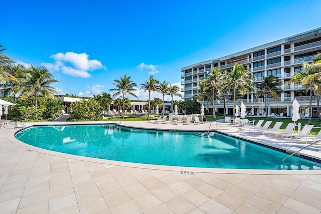 view of swimming pool featuring a patio