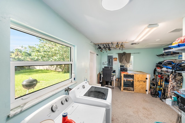 laundry room featuring carpet and washing machine and dryer