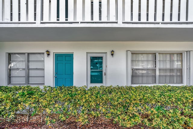 doorway to property with a balcony