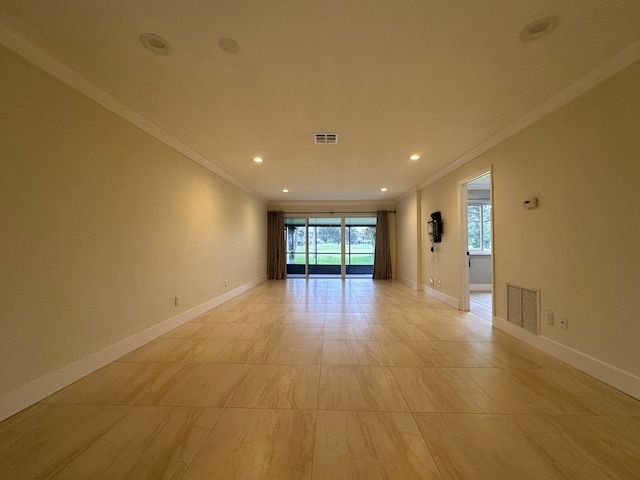 spare room featuring ornamental molding