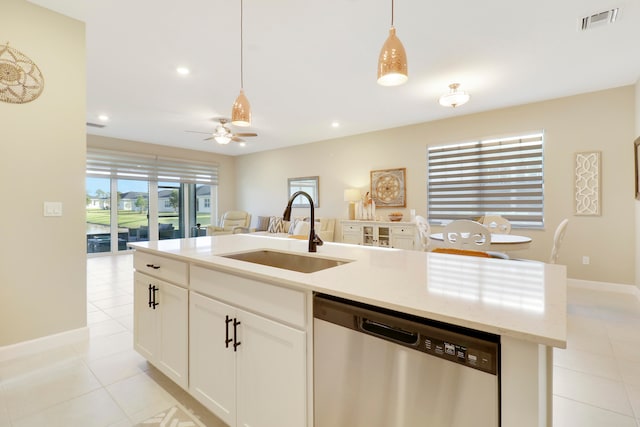 kitchen with dishwasher, a kitchen island with sink, sink, decorative light fixtures, and white cabinets