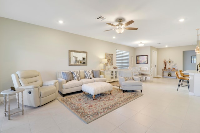 living room featuring ceiling fan