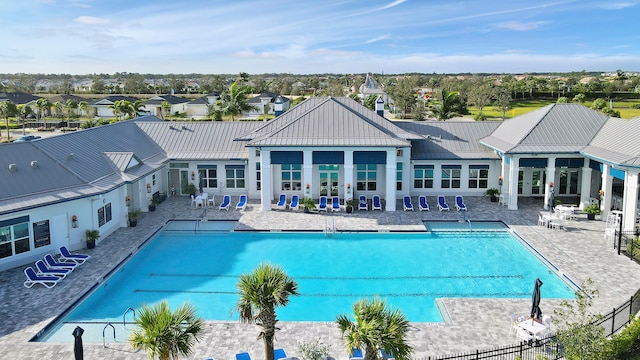 view of pool featuring a patio area