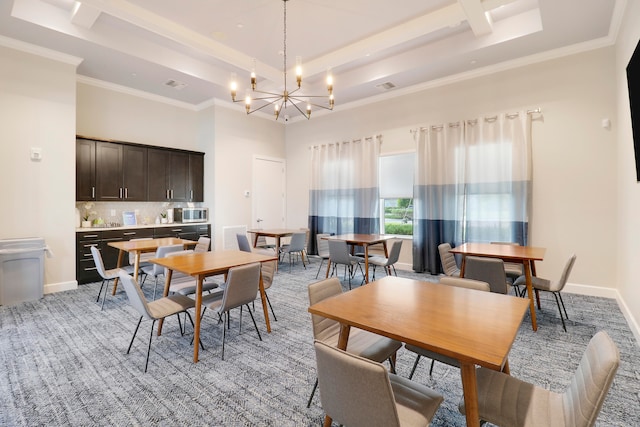 dining space featuring beam ceiling, crown molding, and a notable chandelier