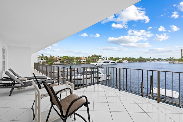 balcony featuring a water view