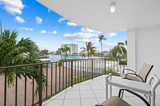 balcony featuring a water view