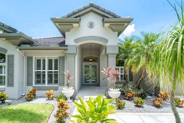 doorway to property featuring french doors