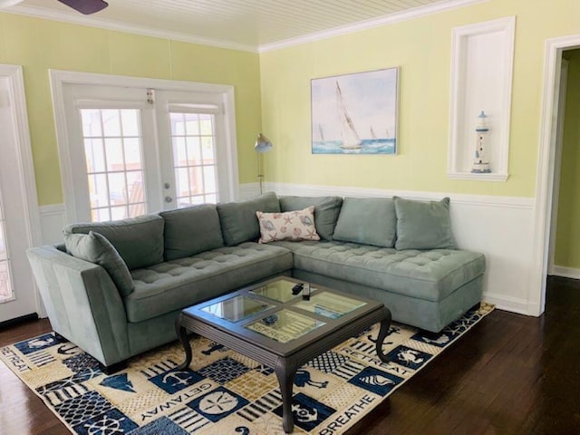 living room featuring ornamental molding, french doors, and dark hardwood / wood-style flooring