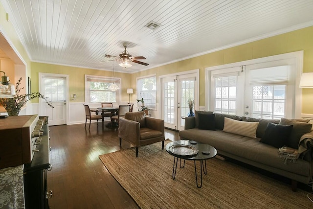 living room featuring crown molding, dark hardwood / wood-style floors, wooden ceiling, and french doors