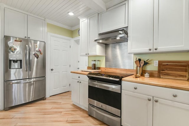 kitchen with butcher block counters, ventilation hood, stainless steel appliances, light hardwood / wood-style floors, and white cabinets