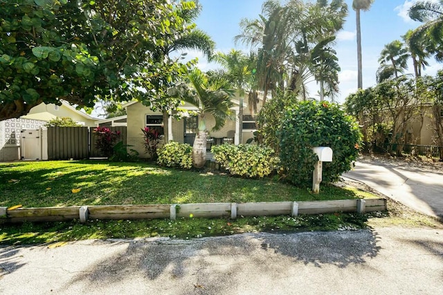 view of front of property with a front lawn