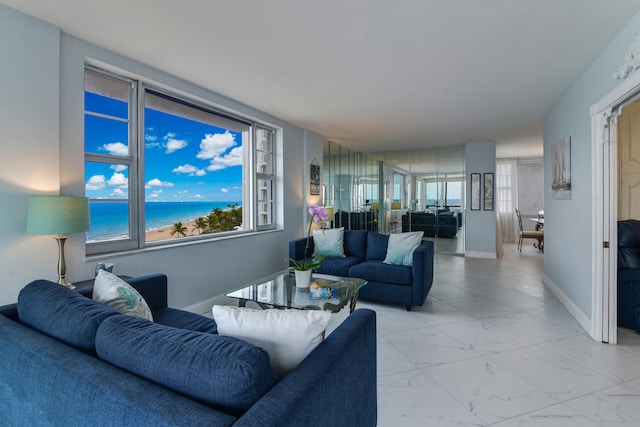 living room featuring a water view