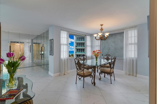 dining room featuring an inviting chandelier