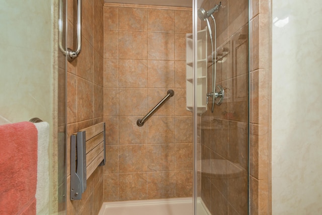 bathroom with an enclosed shower