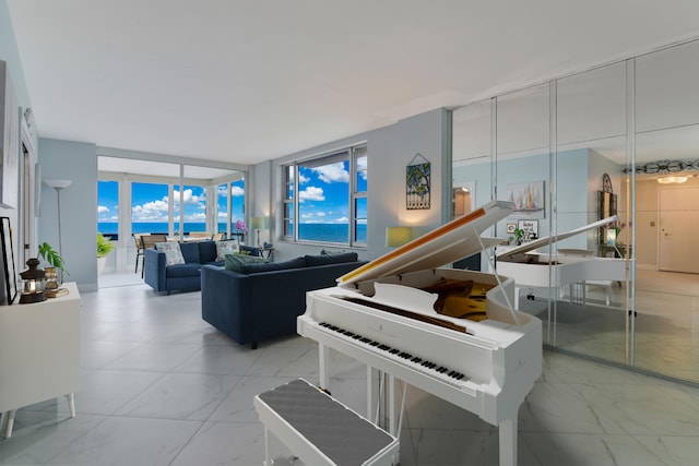 miscellaneous room featuring floor to ceiling windows