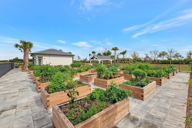 11762 SW Waterford Isle Way, Port Saint Lucie, FL 34987 - view of patio / terrace with a gazebo, a vegetable garden, and fence