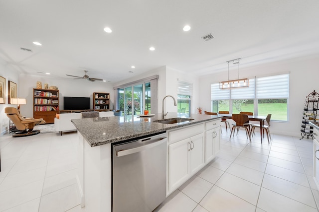 11762 SW Waterford Isle Way, Port Saint Lucie, FL 34987 - kitchen featuring dishwasher, a sink, recessed lighting, stone counters, and a kitchen island with sink