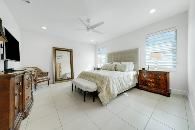 tiled bedroom with ceiling fan