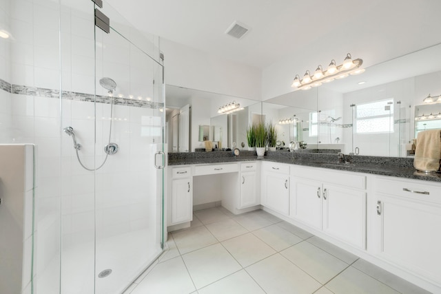 11762 SW Waterford Isle Way, Port Saint Lucie, FL 34987 - full bath featuring a stall shower, vanity, and tile patterned flooring