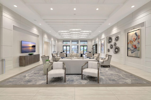 11762 SW Waterford Isle Way, Port Saint Lucie, FL 34987 - living room featuring recessed lighting, tile patterned floors, beam ceiling, and a decorative wall