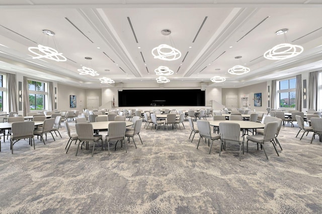 dining room with a wealth of natural light and carpet