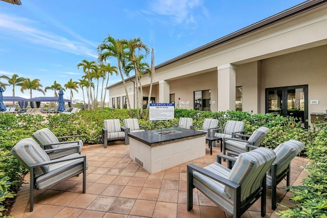 view of patio / terrace featuring a fire pit