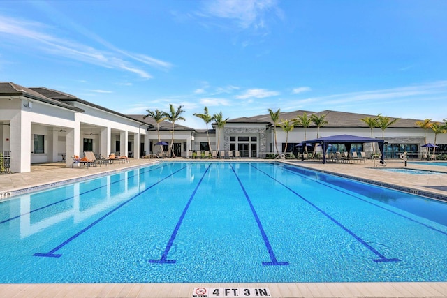 view of pool featuring a patio