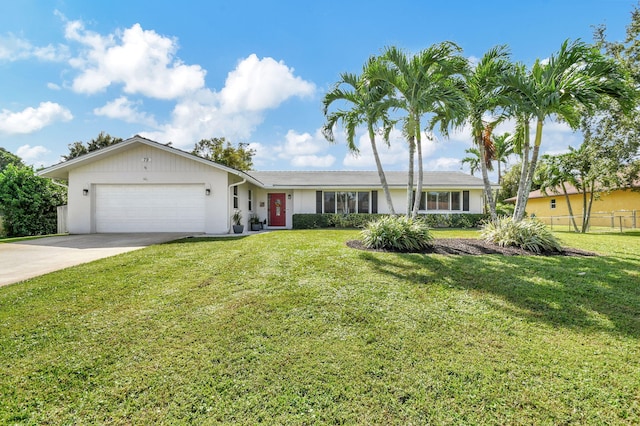 ranch-style house with a front yard and a garage