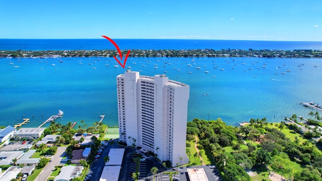 birds eye view of property featuring a water view