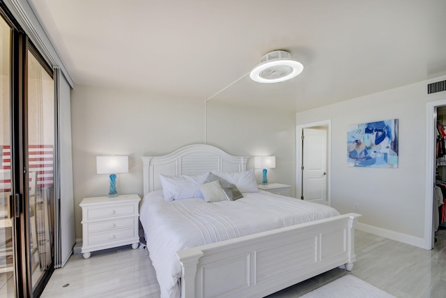 bedroom featuring light wood-type flooring