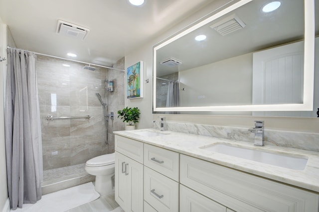 bathroom featuring vanity, toilet, and a shower with curtain