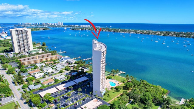 birds eye view of property featuring a water view