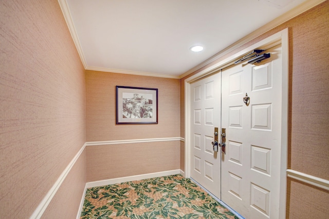 entryway with crown molding