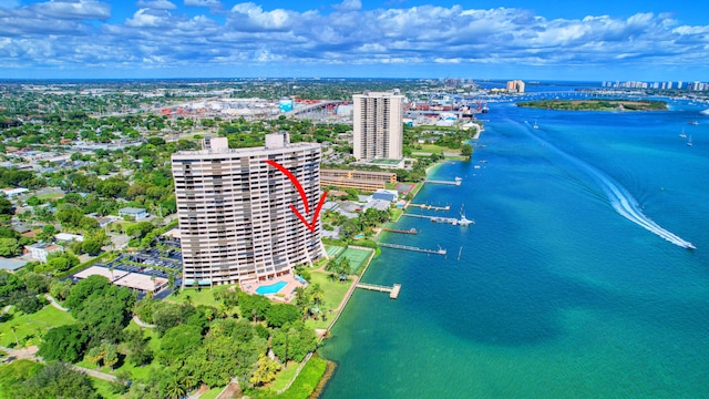 birds eye view of property with a water view