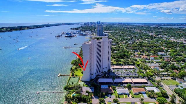 birds eye view of property with a water view