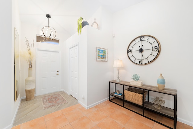 foyer entrance featuring light tile patterned floors