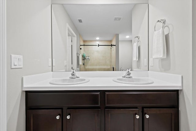 541 SW Nadell Ct, Port Saint Lucie, FL 34953 - full bath with double vanity and a tile shower