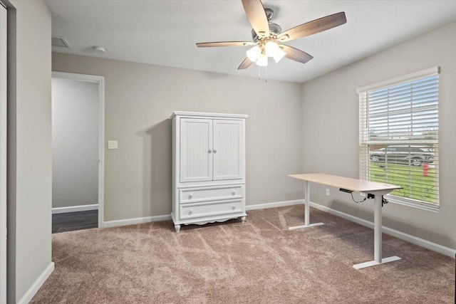 541 SW Nadell Ct, Port Saint Lucie, FL 34953 - office with carpet floors, a ceiling fan, and baseboards