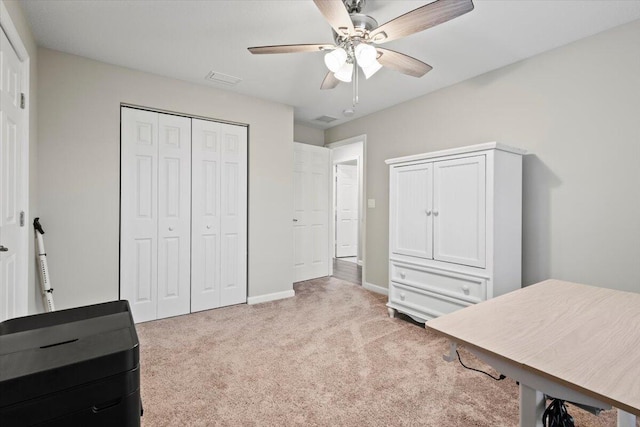 541 SW Nadell Ct, Port Saint Lucie, FL 34953 - bedroom with carpet floors, a closet, baseboards, and ceiling fan