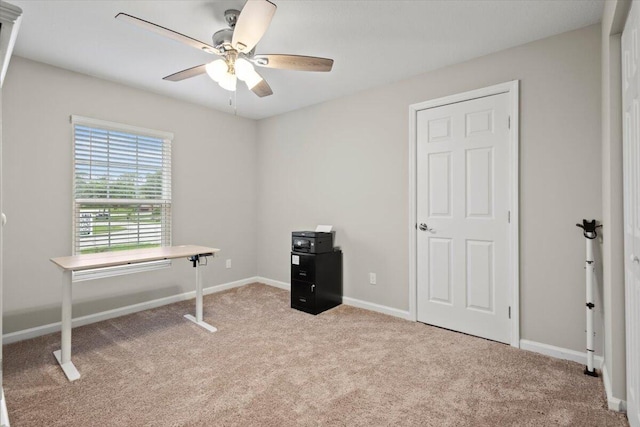 miscellaneous room with light colored carpet and ceiling fan