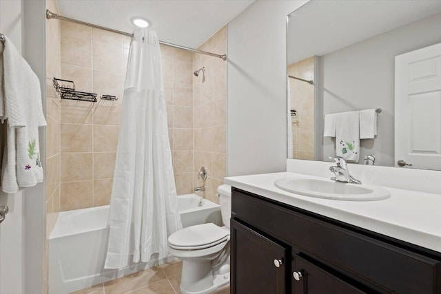 541 SW Nadell Ct, Port Saint Lucie, FL 34953 - bathroom featuring shower / bathtub combination with curtain, vanity, toilet, and tile patterned floors