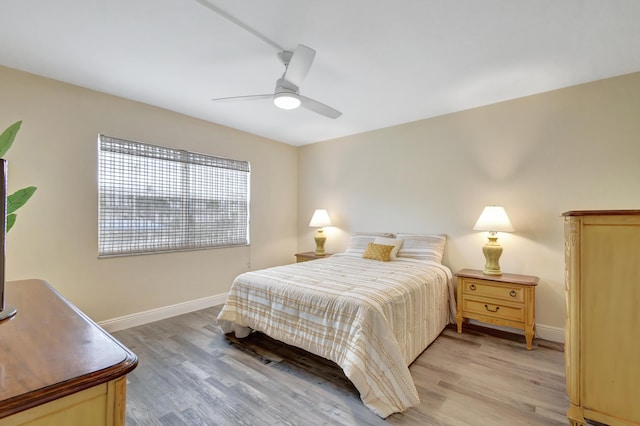 bedroom featuring ceiling fan and light wood-type flooring