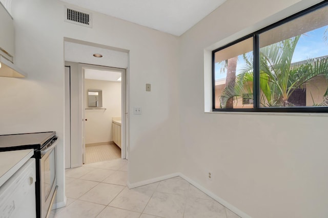 interior space with light tile patterned flooring