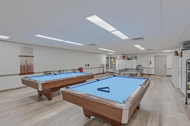 game room featuring pool table, light hardwood / wood-style flooring, and a paneled ceiling