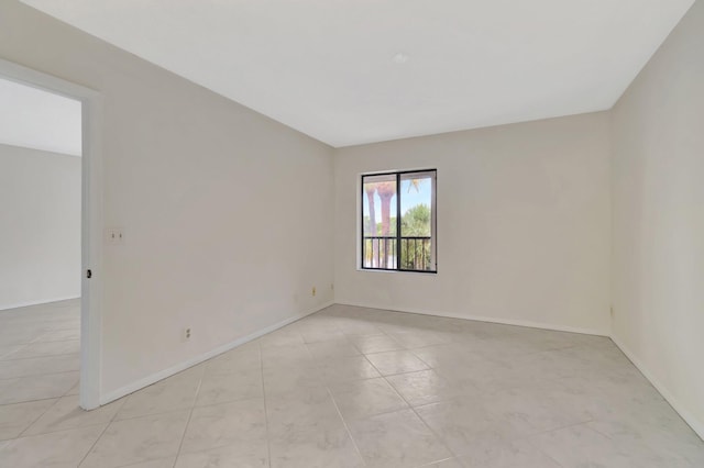 view of tiled spare room