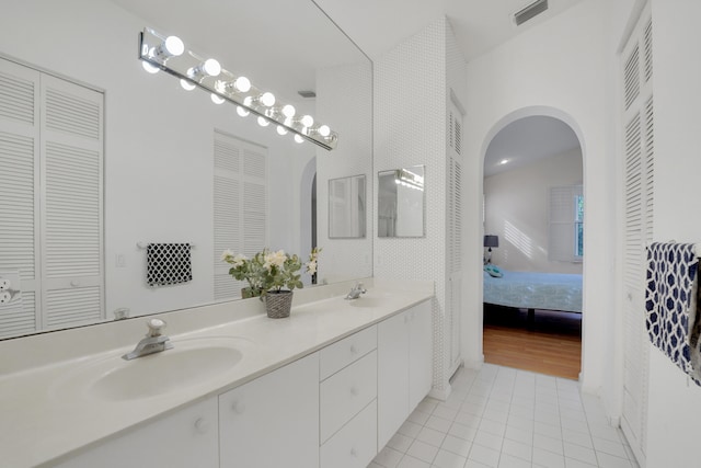 bathroom featuring vanity and tile patterned floors