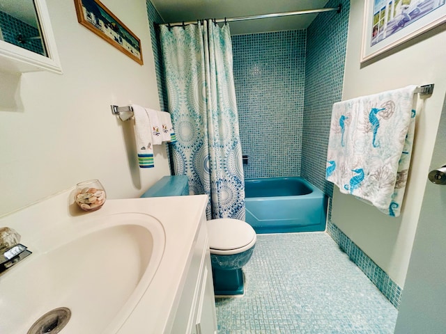 full bathroom featuring toilet, vanity, shower / bath combination with curtain, and tile patterned flooring