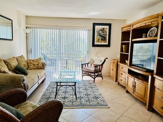 tiled living room with a textured ceiling