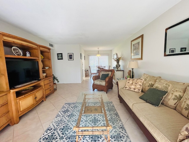 living room with light tile patterned floors